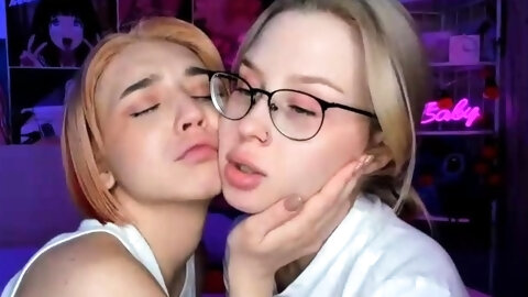 Turned on blonde teen lesbians sticking dildos up their vags
