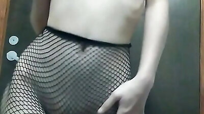In fishnet tights