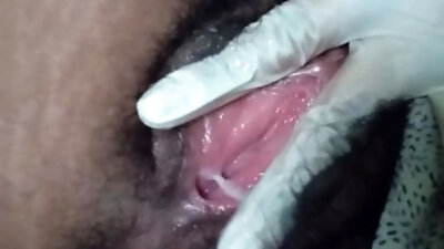 Playing with my pussy with a glove on
